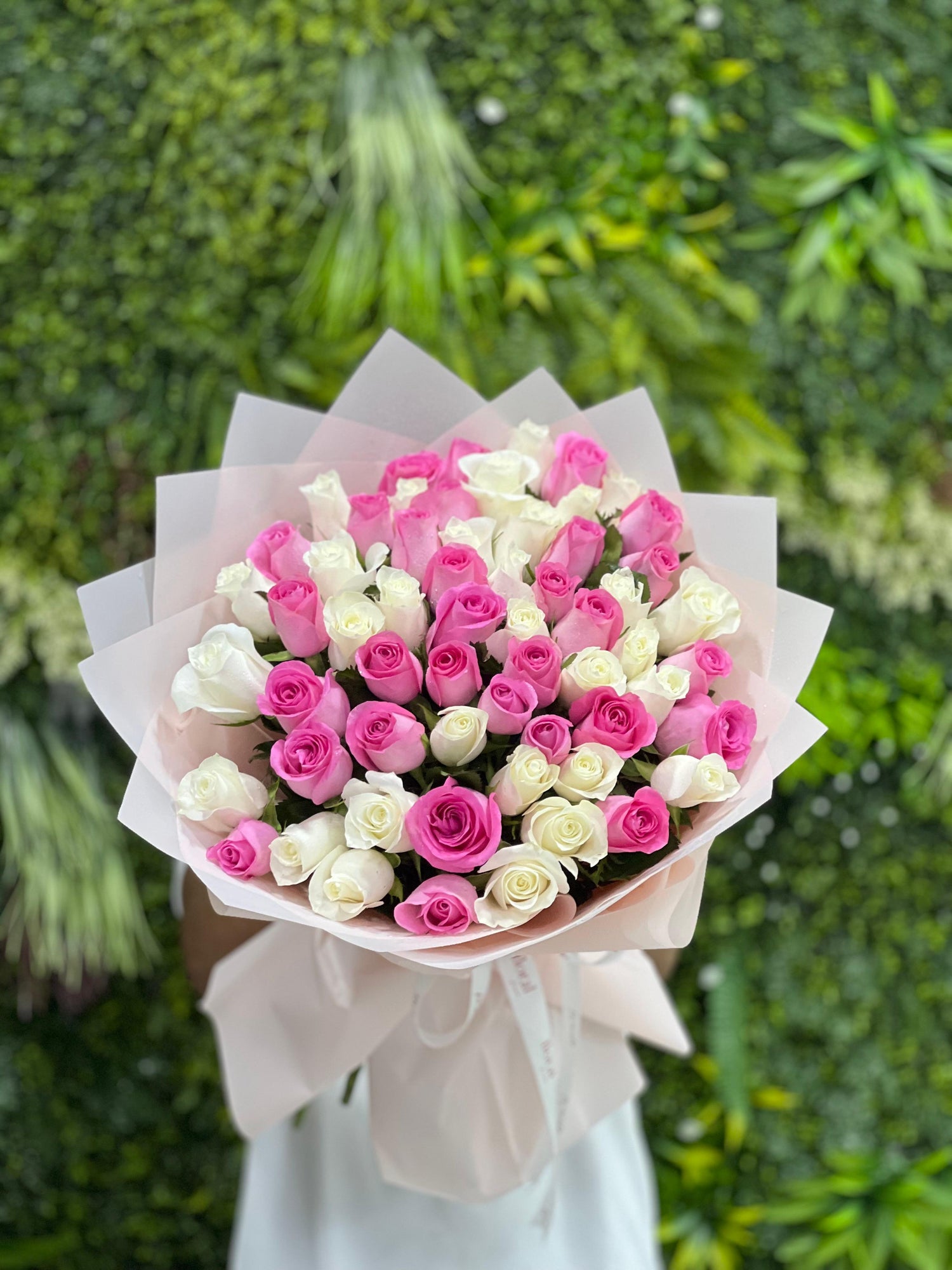 61 pink and white roses bouquet